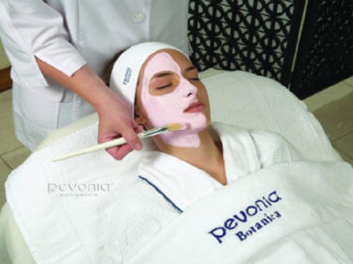 Woman Getting Facial Treatment