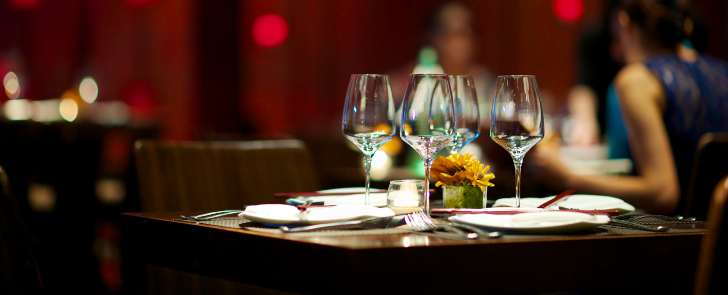table setting with wine glasses in a restaurant
